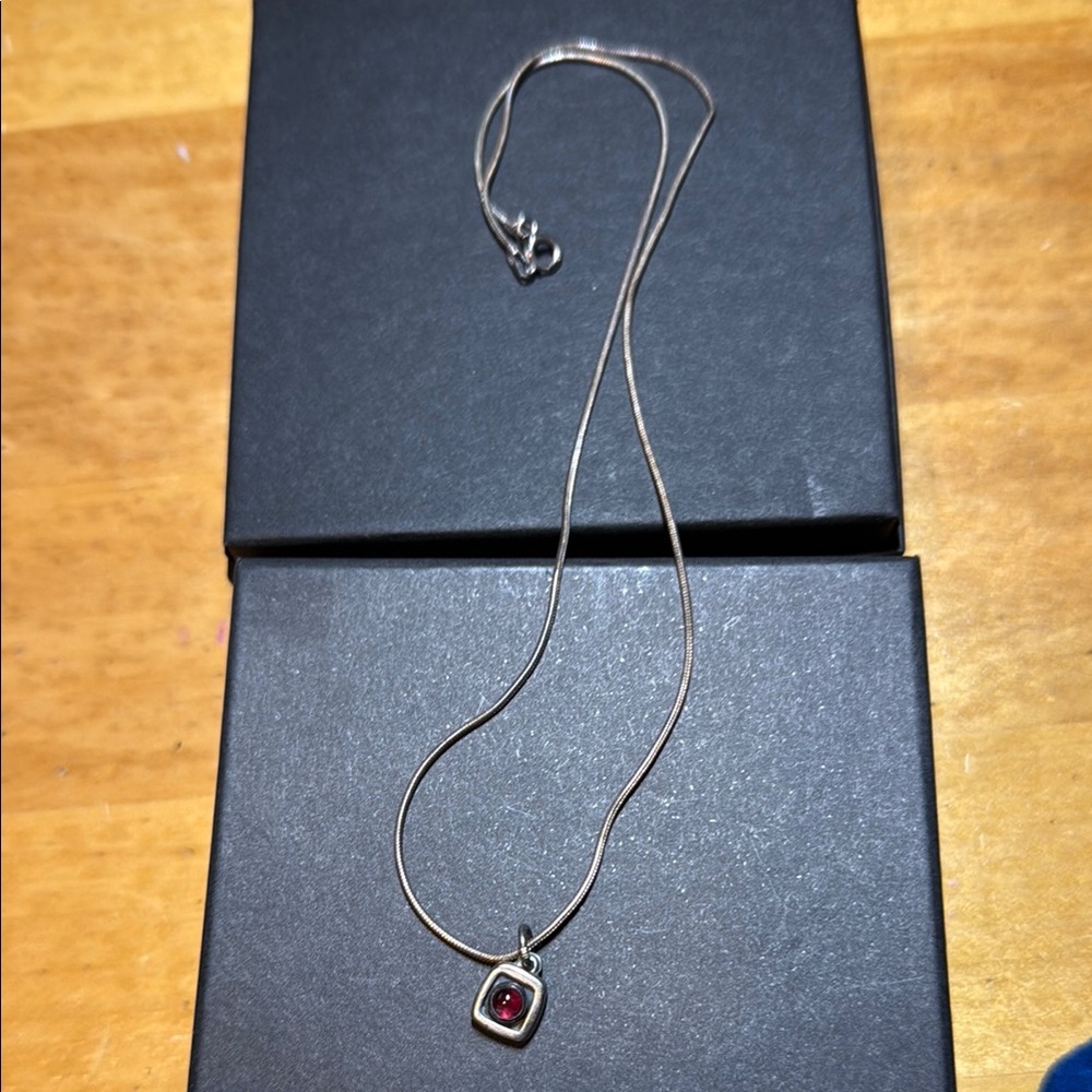 Elegant Silver Necklace with Red Gemstone